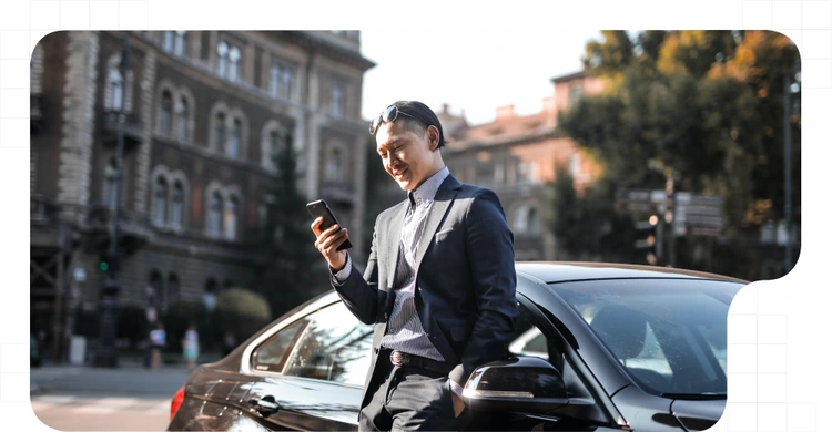Man with a phone searching a carshing platform