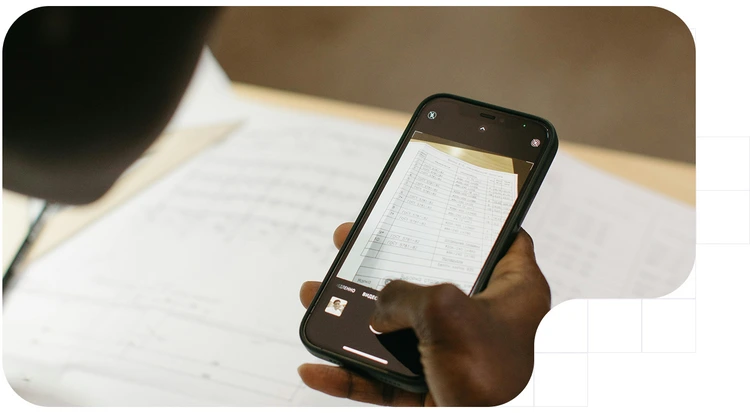 Person scaning a document with their phone
