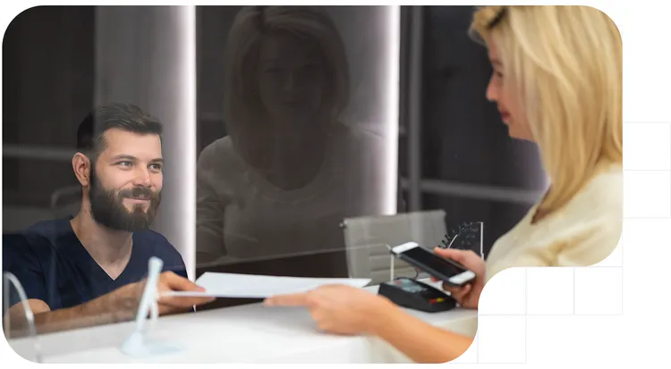 A person signing a leasing contract in a bank