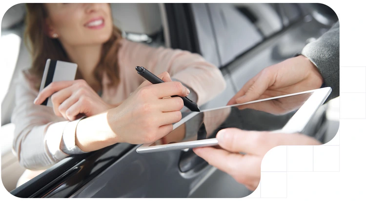 A woman signing a leasing contract with electronic sign on a tablet