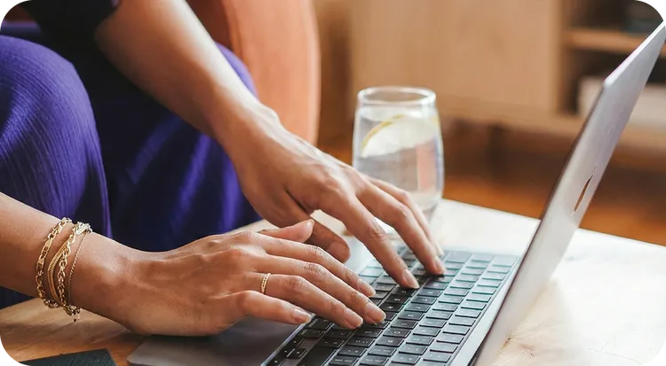 Person managing a digital signature from their laptop.